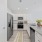 Stainless Steel Appliances & Tile Backsplash